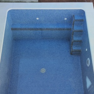 Instalación de piscina en casa adosada